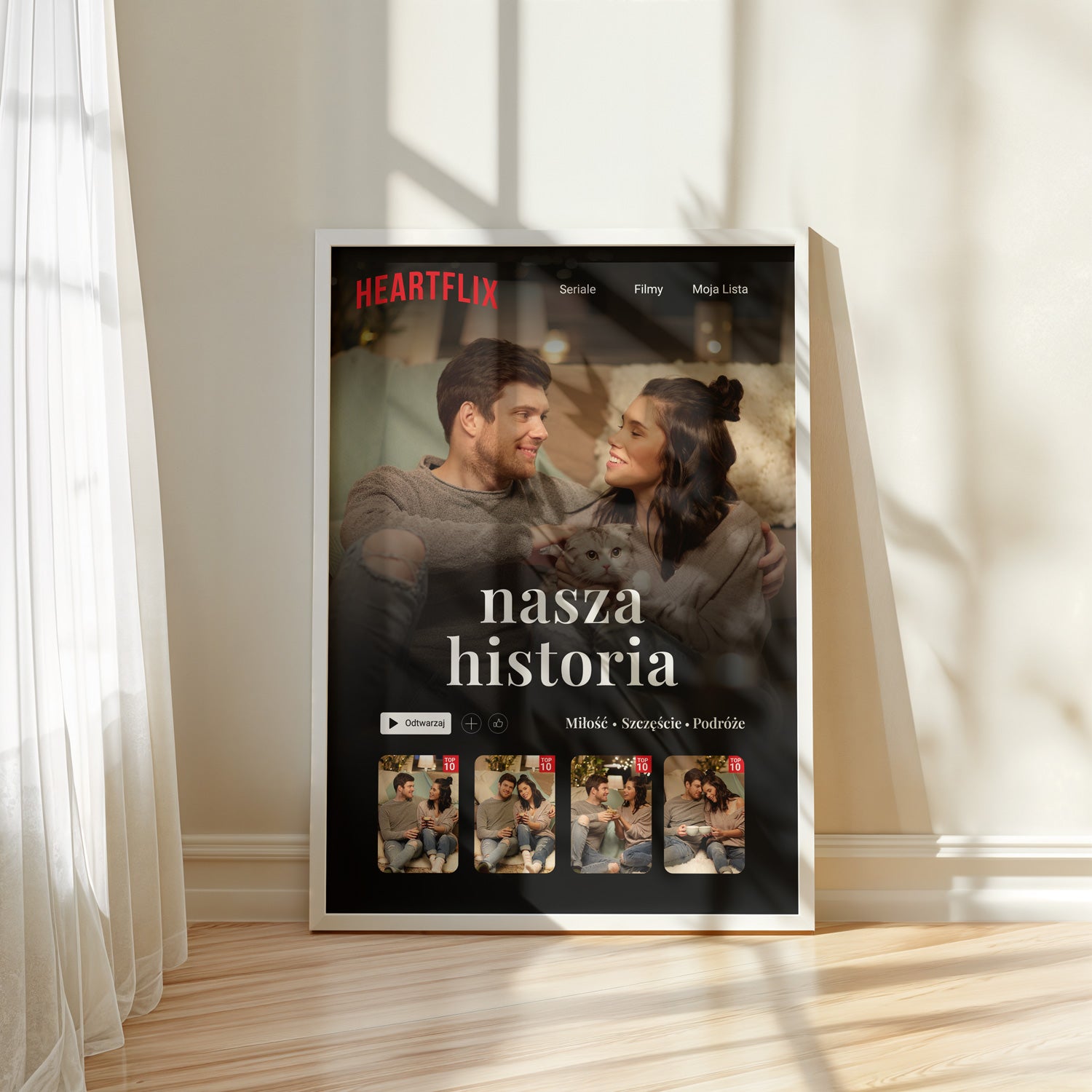 Plakat Heartflix w czarnej ramce na ścianie salonu - personalizowany prezent dla pary
