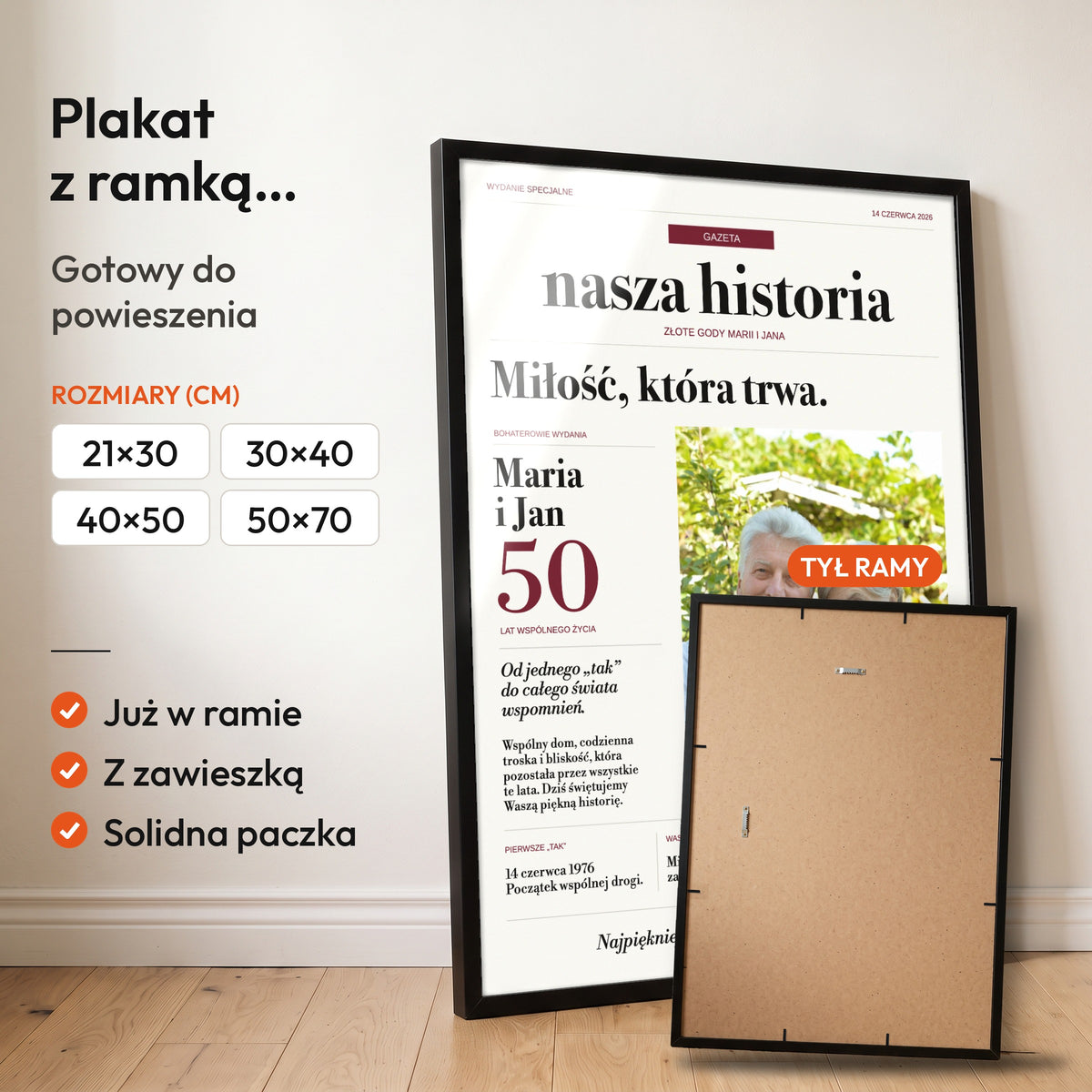 Nasza Historia — plakat z ramką, gotowy do powieszenia: czarna rama od przodu i tył ramy z zawieszką. C-PL-GAZ-17-2130-NF